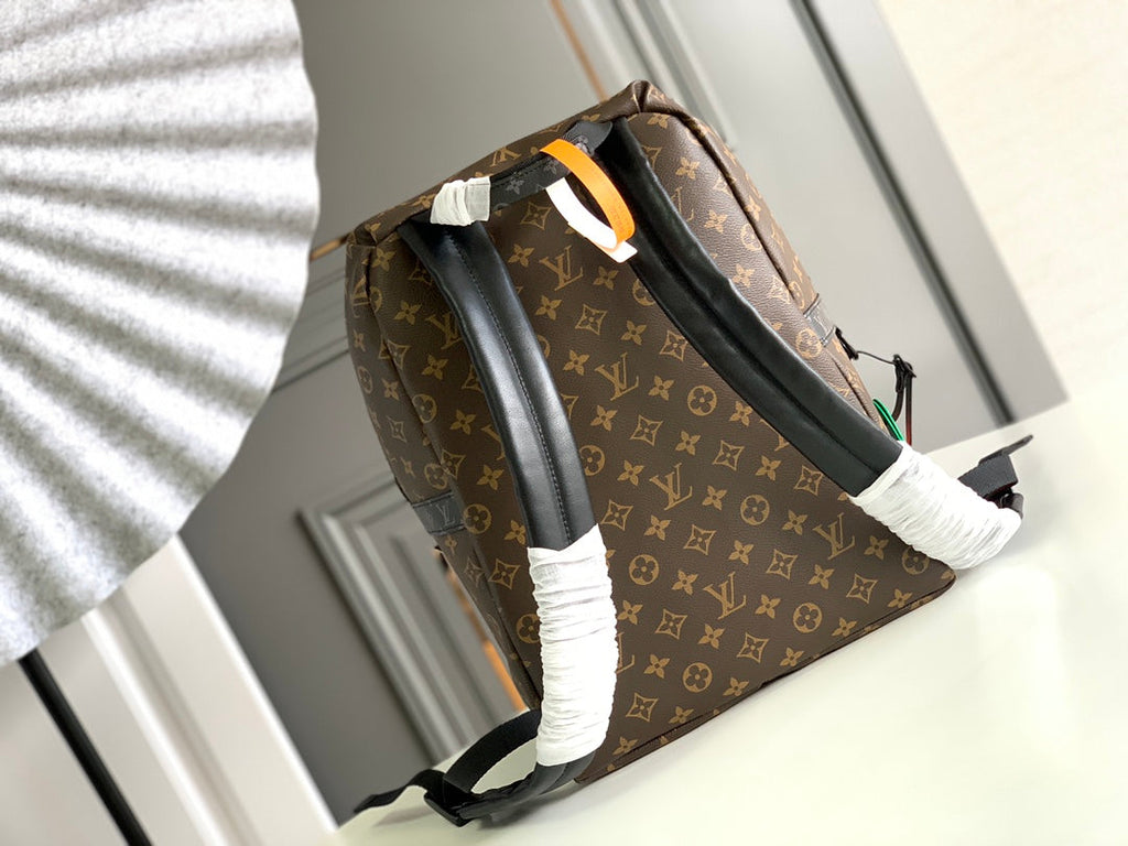 LOUIS VUITTON DISCOVERY BACKPACK 40 IN BROWN MONOGRAM CANVAS RUBBER LOGO
