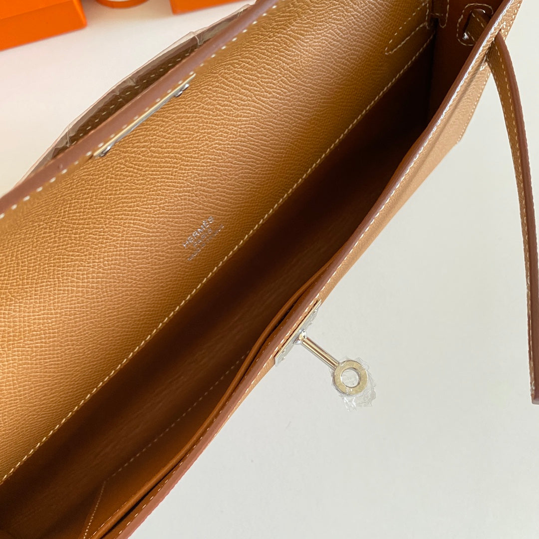 HERMES KELLY CUT 31 IN BRONZE BROWN CALFSKIN WITH SILVER HARDWARE