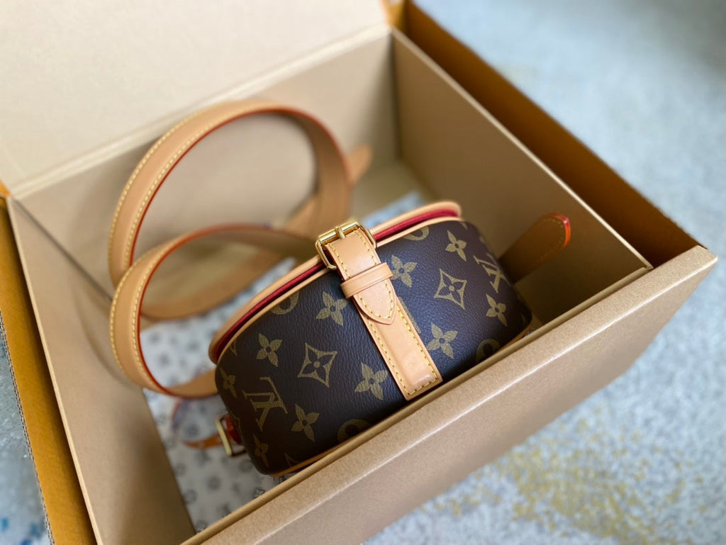 LOUIS VUITTON SADDLE BAG 18 IN BROWN MONOGRAM CANVAS AND LEATHER TRIM