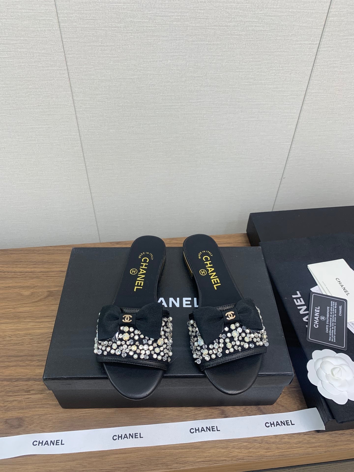 CHANEL BOW SLIPPERS IN BLACK LAMBSKIN WITH RHINESTONES